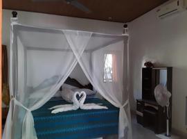 Blue Star Bungalows & Cafe, hotell i Amed