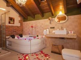 Apartamentos El Aramo Asturias, hotel v destinaci Pola de Lena