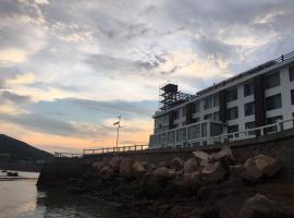 Zhujiajian Cliff Hotel, отель в городе Чжоушань