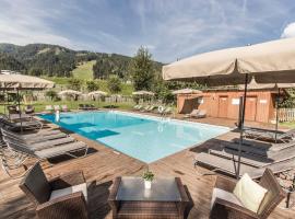 Familienresort Reslwirt, resort a Flachau