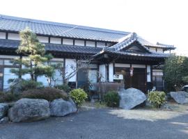 Minshuku Shiroyama, hotel med parkering i Taketa