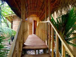 Seasons Four Eco Friendly Treehouse, cabaña o casa de campo en Matara
