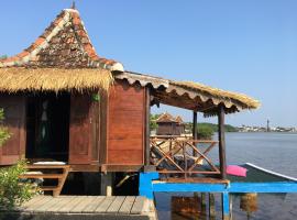 Omah Alchy Cottages, vakantiewoning aan het strand in Karimunjawa