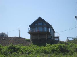 Bord de l'eau Maison toit Cathédrale Fenestré, rental pantai di Sainte-Félicité