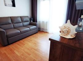 Apartamenty na pięterku, hotel in Mielno