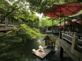 Zhou Ye Cottage, cabaña o casa de campo en Sanyi