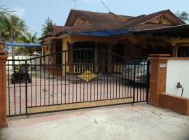 Beachland Guesthouse, allotjament vacacional a Kuala Terengganu