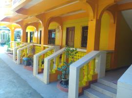 Queen of Isle Cottages and Restaurant, hotel in Puerto Galera