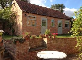 Ivy Cottage, hotel with parking in Laxton