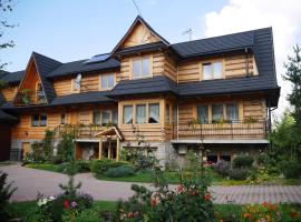 Biołe Izby, hotel i Chochołów