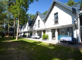 Apartamenty Leśne Tarasy, hotel in Dębki
