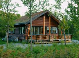 Cabin by the river, accommodation in Storslett