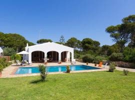 Casa con jardín y piscina - MORELL ONZE: Cala Morell'de bir tatil evi