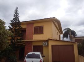 Viesnīca Apartamento amplo 300m da praia pilsētā Sanlorensu du Sula
