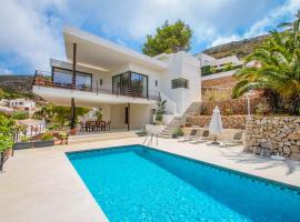 Laja - panoramic hillside holiday house in Moraira, hotel with pools in Moraira