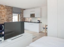 2,5 Zi Design Loft Wohnung mit Gartensitzplatz, golfový hotel v Basileji