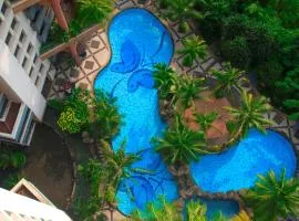 Grand Tropic Suites Hotel