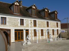 Le Manoir des Chapelles, готель у місті Venoy