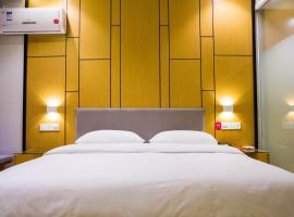 Elan Hotel Qianjiang Eastern Road Taiji Plaza, hotel v destinaci Sanjiang