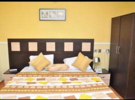 Atlantis Grand Suites, מלון בOfatedo