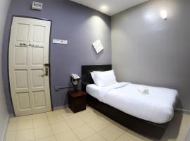 JV Hotel @ Bandar Tasek Mutiara, viešbutis mieste Simpang Ampat