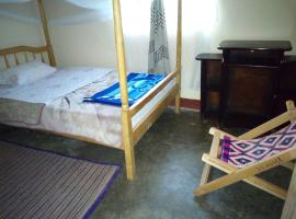 Rwenzori Trekking Homestay, hotel with parking in Nyakalengija