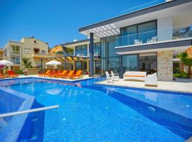 Villa Unlimited 5 Bedroom Luxury Villa with Infinity Pool, luksuzni hotel u gradu Kalkan