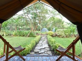 Red Rocks Rwanda - Campsite & Guesthouse, nakvynės namai mieste Nyakinama