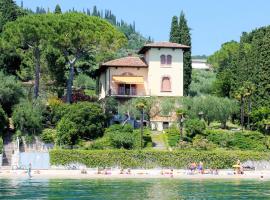 Villa Fasanella: Cottage sulla spiaggia, hotel en Garda