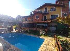 Pousada Palma Chalés, hôtel avec piscine à Monte Verde