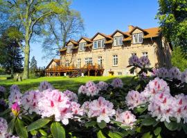 Gut Settin am See - Ferienhäuser, hotel with parking in Settin