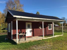 Vallby Farm Camp, cabaña o casa de campo en Örebro