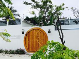 Noovilu Suites Maldives, proprietate de vacanță aproape de plajă din Mahibadhoo