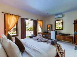 Arton Resort & Beach Club, hotel en Pulukan