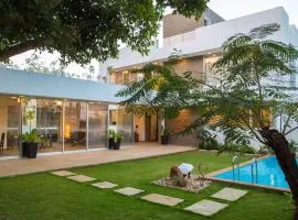 El House by StayVista - Unwind in a Villa with Pool and Lush Lawn