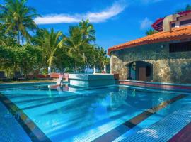 Las Olas Beach Resort, hotel s parkiralištem u gradu 'La Barqueta'