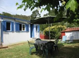 Bonito bungalow con jardín en playa Nerga