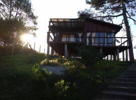 Cabaña en la playa. ventanales y terraza al mar, chalupa v destinaci Salinas