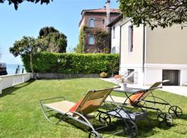 Villa Une, garden, beach and culture, hotell i Venedig-Lido
