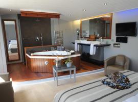 Elégance Suites Hôtel โรงแรมในเลอบัวส์-ปลาจ-อ็อง-เร