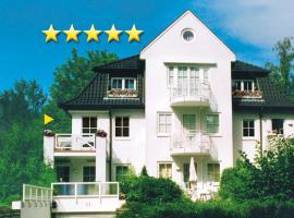 Sonnige Ferienwohnung am Meer, hotel u kojem su ljubimci dozvoljeni u gradu 'Travemünde'