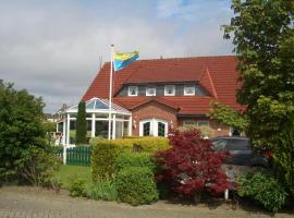 Haus Delphin, hotell sihtkohas Neuharlingersiel huviväärsuse Ferry Terminal Neuharlingersiel lähedal