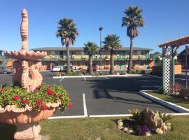 Sand Castle Inn, motel en Seaside