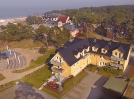 Ferienwohnung zur Düne โรงแรมในทรัสเซนไฮเดอ