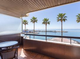 Beachfront Apartment Marbella, resort in Marbella