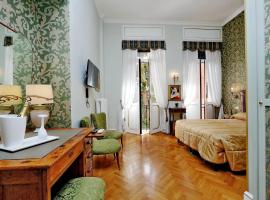 Domus Monamì Luxury Suites, hotelli Roomassa lähellä maamerkkiä Villa Aurelia