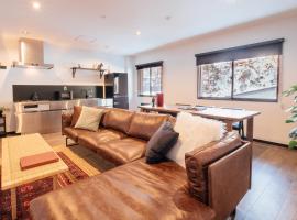 Happo Apartments by HHG、白馬村のホテル