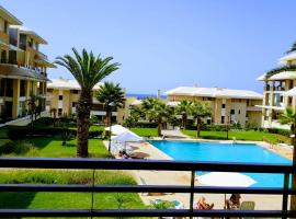 Plage Des Nations Golf Resort, hotel in Sidi Bouqnadel
