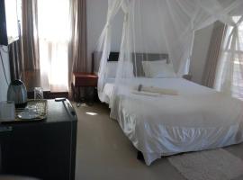 Kuku Royal Lodge, room in Ndola