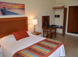 Suites SanRey, hotel v mestu Puerto Morelos